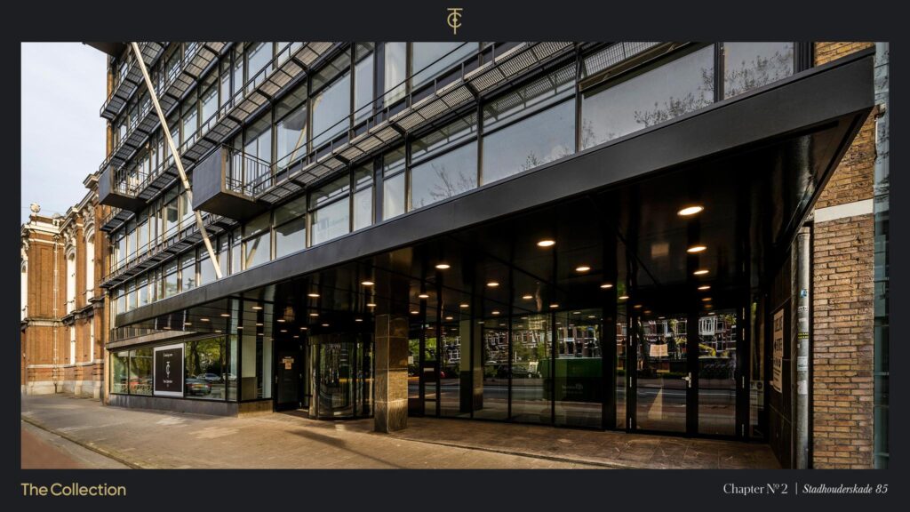 Modern office building entrance at Stadhouderskade 85 in Amsterdam with glass facade and overhanging canopy.