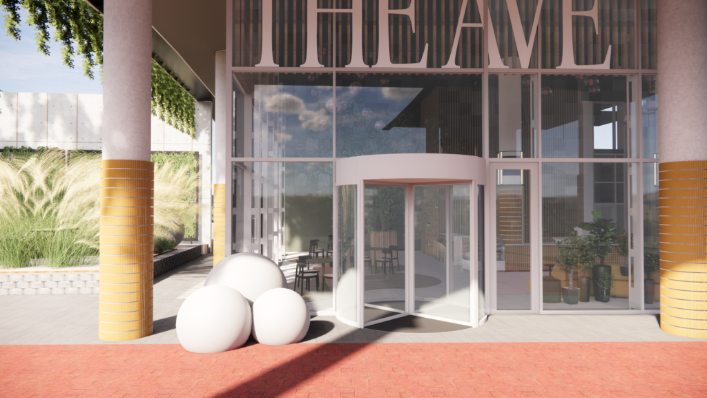 Entrance of The Avenue building with a revolving door, modern decor, and large white sculptural spheres.